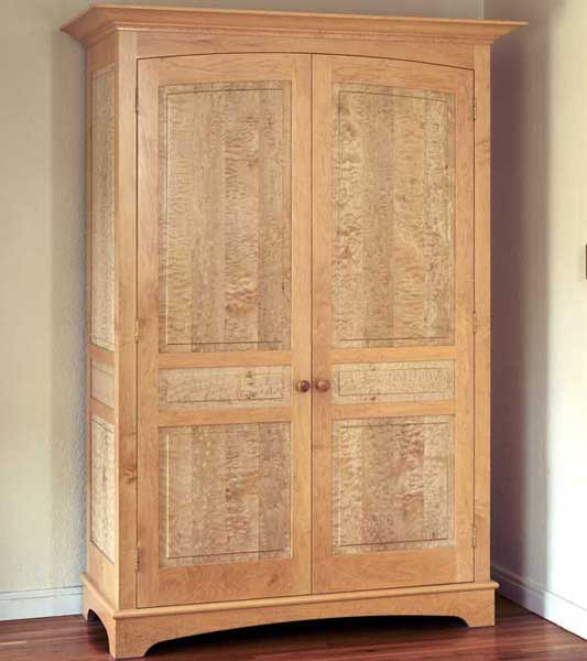 Hard Maple and bleached quilted maple armoire.