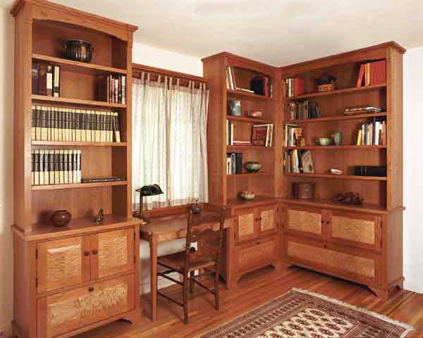 Study bookcases and writing desk, cherry and quilted maple.